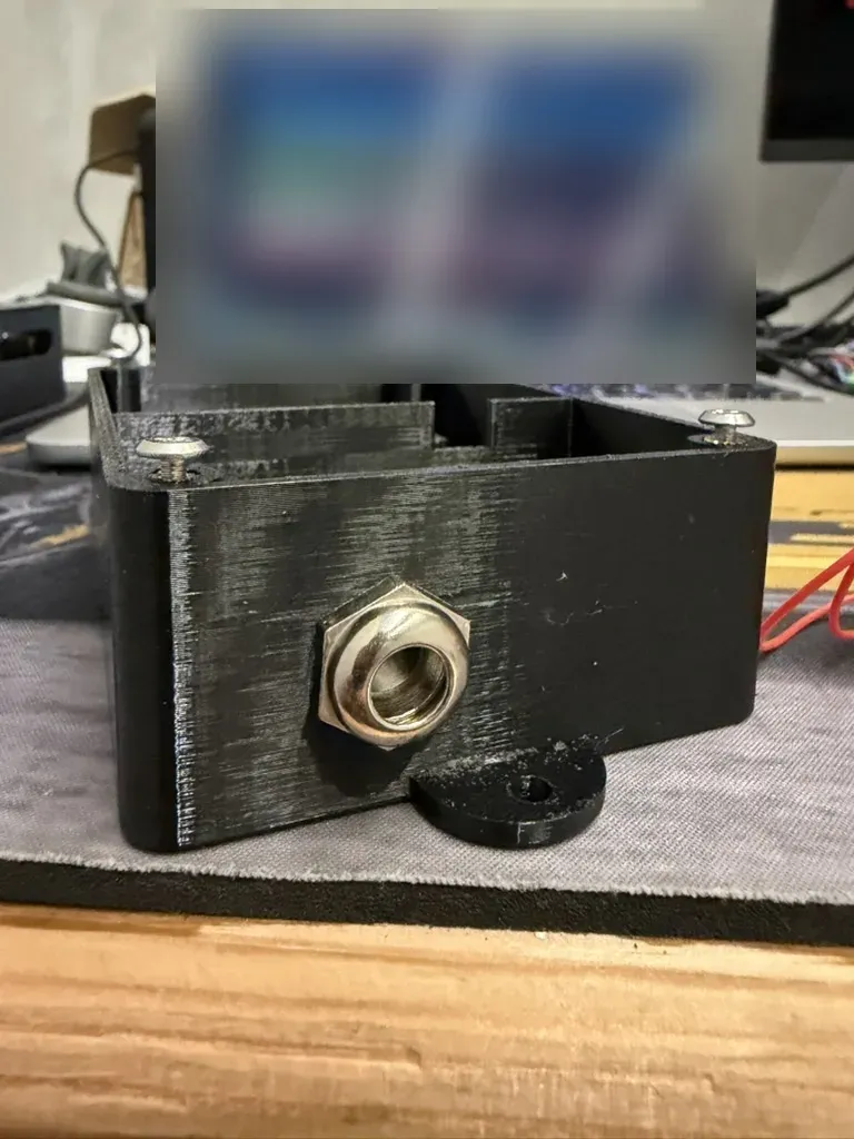The PG7 cable gland fitted in the mains side of the case